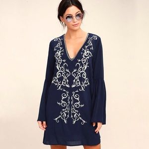 Lulu’s embroidered tunic with bell sleeves